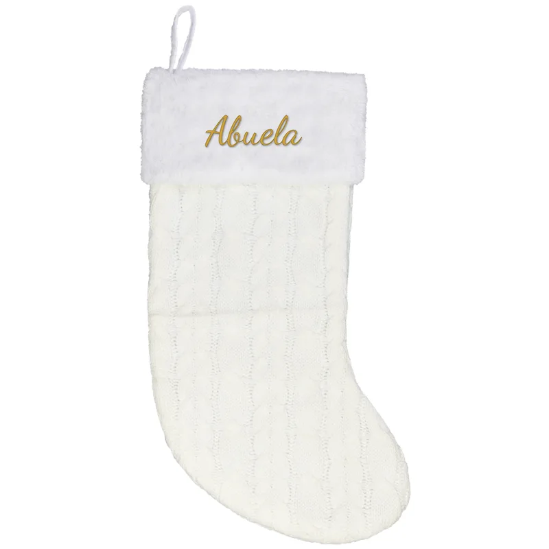Abuela embroidered on a cream Christmas stocking