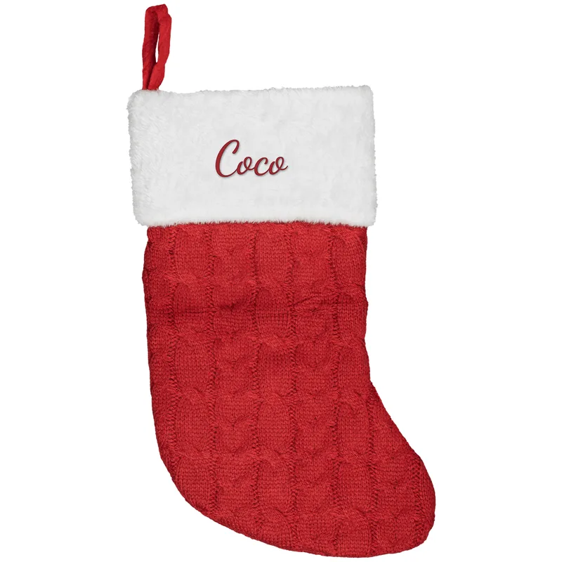 Coco embroidered on a red Christmas stocking