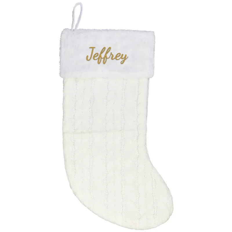 Jeffrey embroidered on a cream Christmas stocking