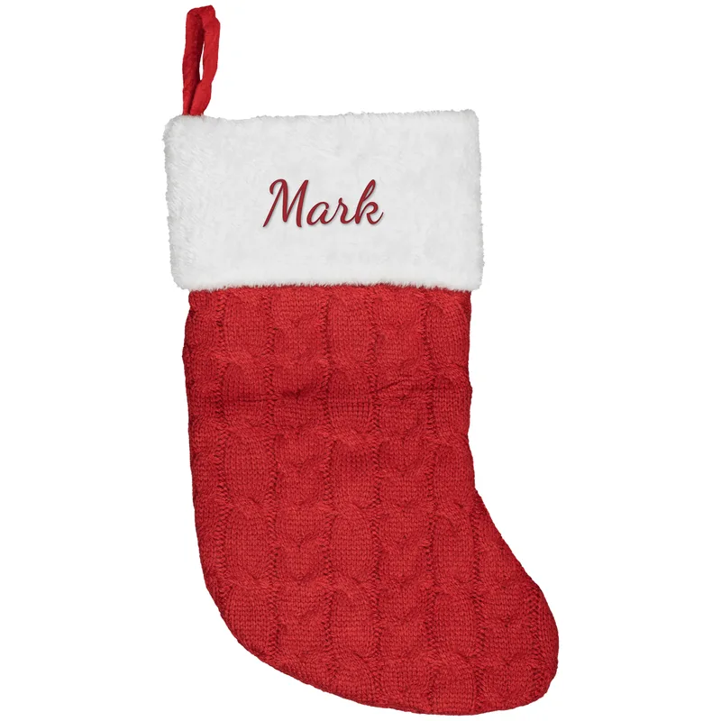 Mark embroidered on a red Christmas stocking
