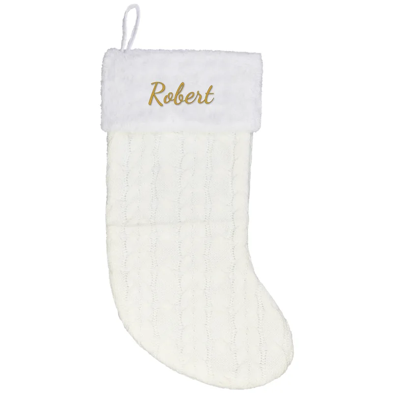 Robert embroidered on a cream Christmas stocking